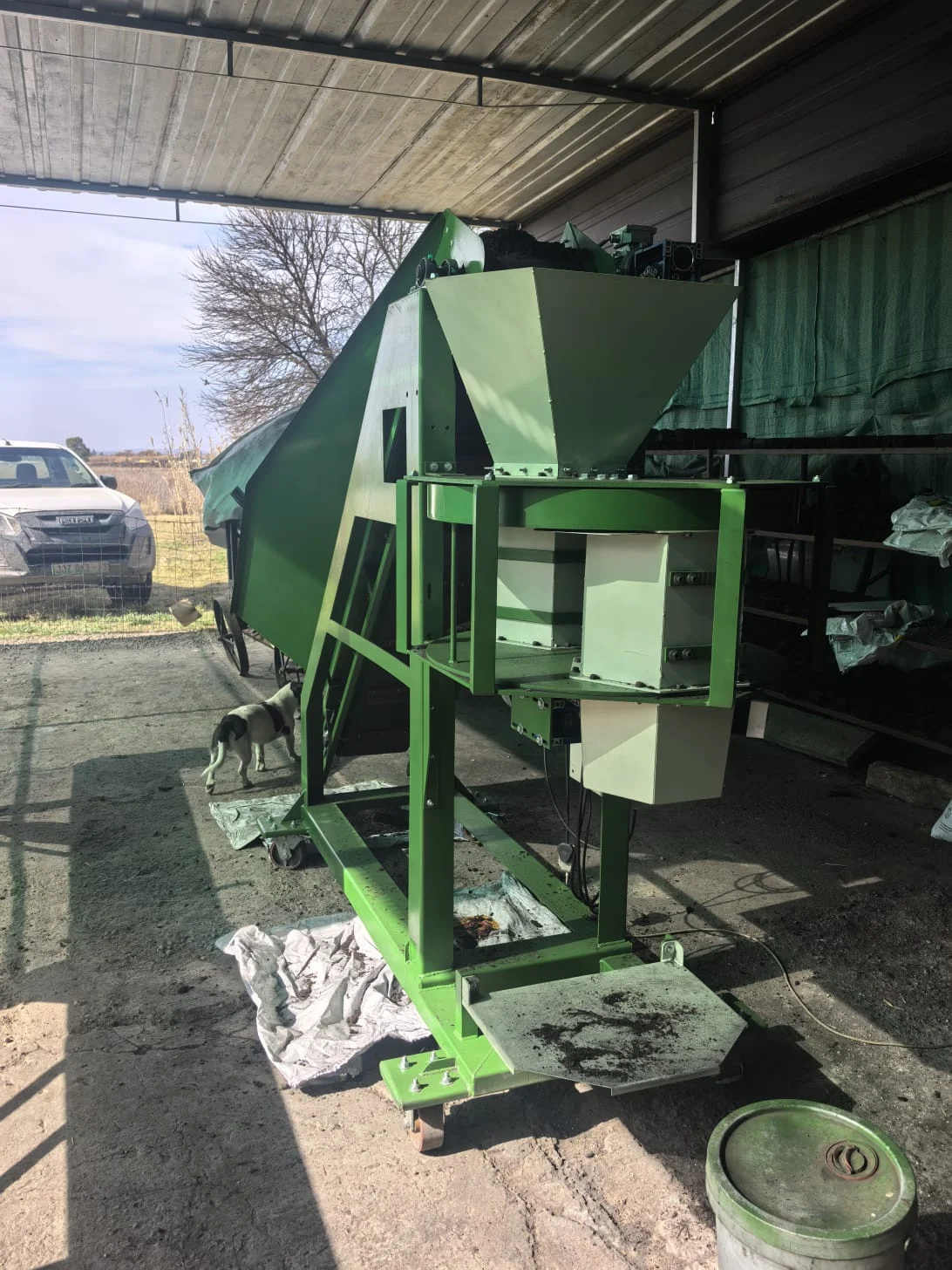 RND Automation Gravity Packer with feed hopper, measuring chambers and mobile frame